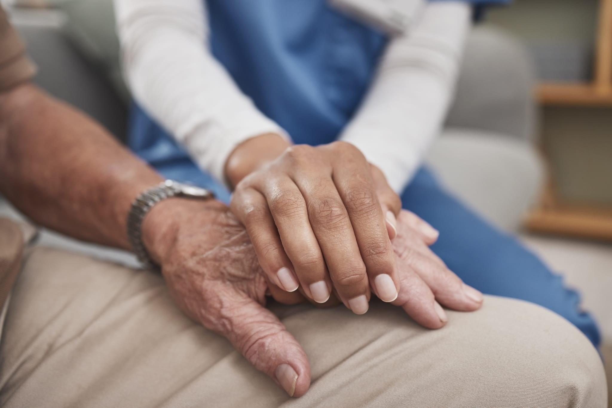 Family and caregiver having a warm conversation